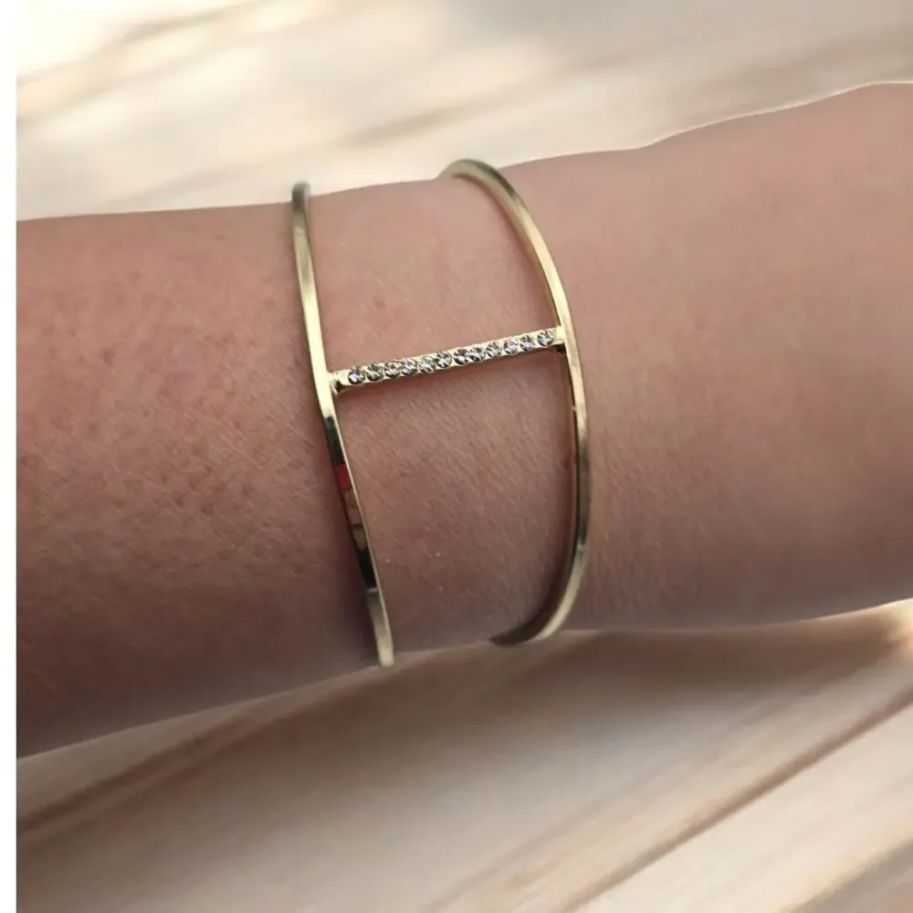 Source Unknown minimalist gold